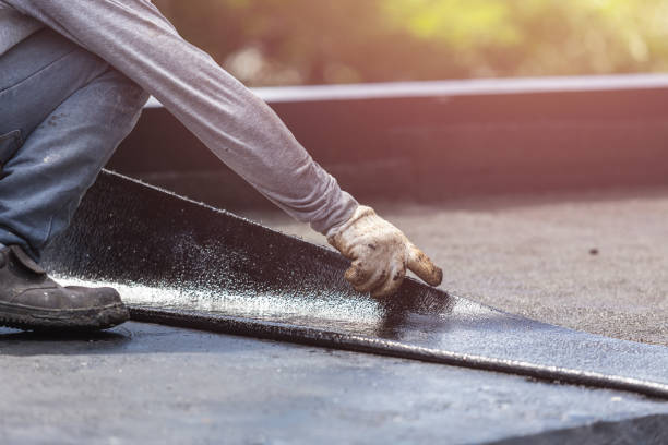 Professional Exterior Waterproofing technician working in Dundee, MI